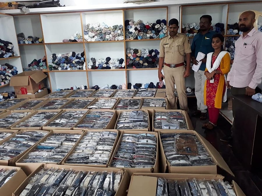 The fake garments of reputed brands seized by the police at a garment-making unit near Honnavar, Uttara Kannada district on Saturday.