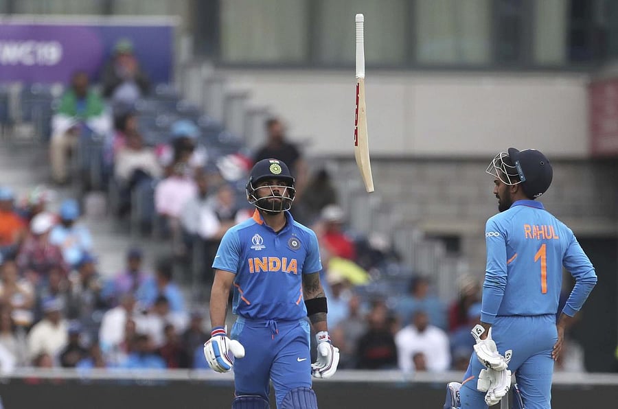 END OF THE ROAD: India’s captain Virat Kohli (left) throws his bat in frustration after being dismissed by New Zealand’s Trent Boult. AP/PTI