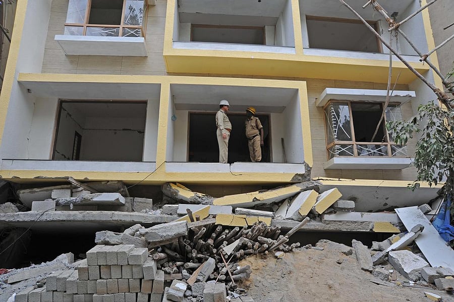 The buildings that collapsed at Hutchins Road on Wednesday. (DH Photo/Pushkar V)