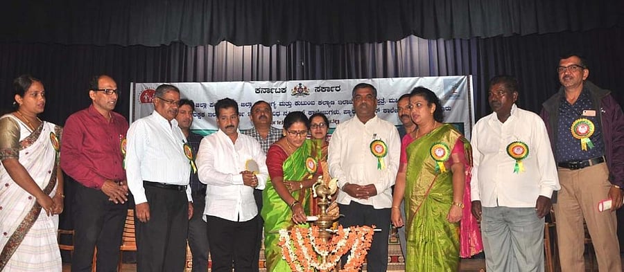Chikkamagaluru Zilla Panchayat President Sujatha Krishnappa inaugurates World Population Day at Kuvempu Kala Mandira in Chikkamagaluru on Thursday. ZP Health and Education Standing Committee President Jacintha Anil Kumar looks on.