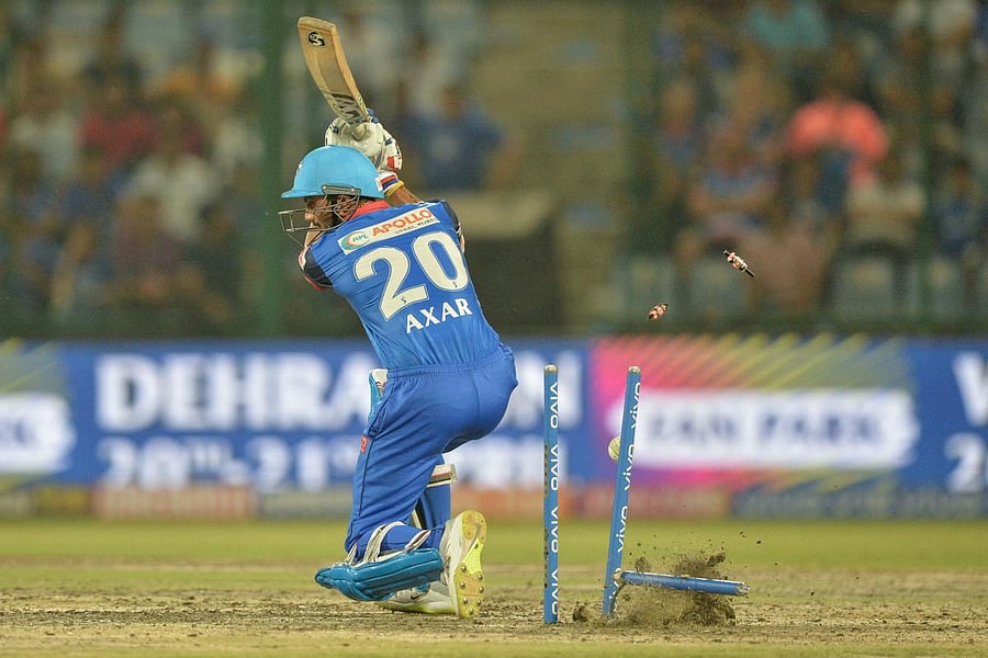 Delhi Capitals' Axar Patel has his stumps rearranged by Mumbai Indians' Jasprit Bumrah during an IPL game on Thursday. AFP