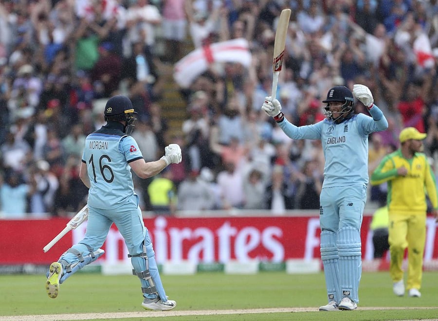 Birmingham: England's captain Eoin Morgan, left, and Joe Root celebrate their win over Australia in the Cricket World Cup semi-final match at Edgbaston in Birmingham, England, Thursday, July 11, 2019. AP/PTI