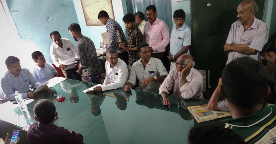 Assistant Commissioner Shivakumar and Tahsildar Ramesh at the revenue and pension adalat held at the Nada Kacheri in Kalasa.