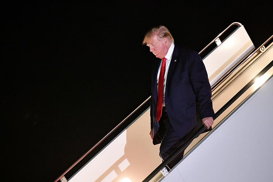US President Donald Trump steps off Air Force One upon arrival at Andrews Air Force Base in Maryland on July 12, 2019. (Photo by MANDEL NGAN / AFP)
