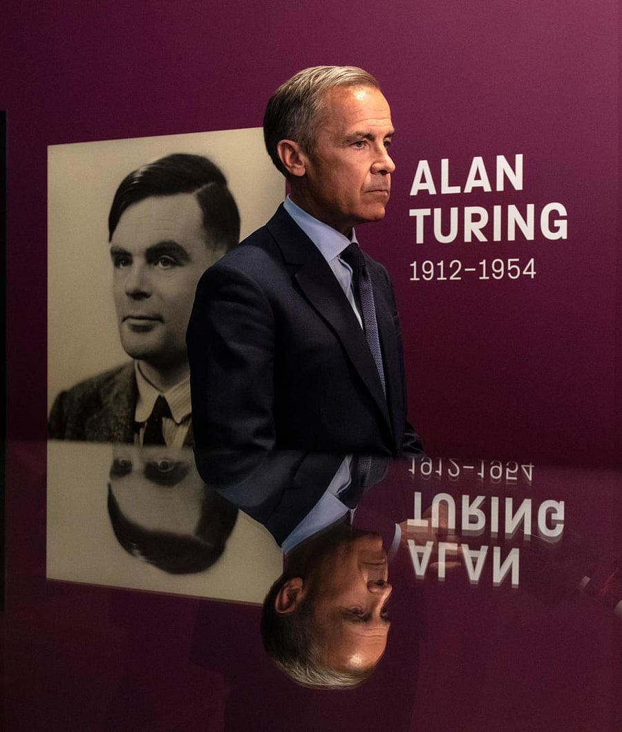 Mark Carney, governor of the Bank of England, is interviewed after attending at a press conference announcing the concept design for the new Bank of England fifty pound banknote, featuring mathematician and scientist Alan Turing, during the presentation a