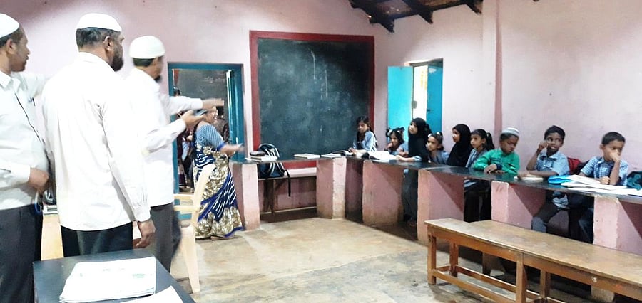 Children are taught in the dining hall, owing to a lack of classrooms at the Government Urdu Primary School, in Banakal.