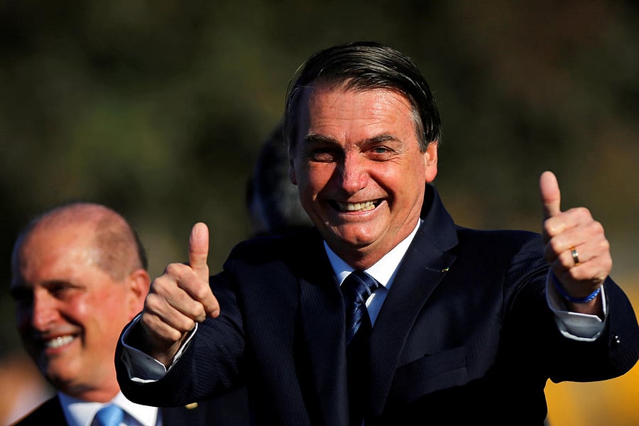 Brazil's President Jair Bolsonaro gestures during a national flag hoisting ceremony at Alvorada Palace in Brasilia, Brazil July 16, 2019. REUTERS/Adriano Machado