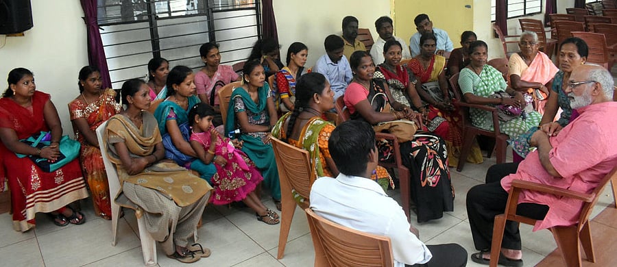 Human Rights Protection Foundation (HRPF) President Ravindranath Shanbhag speaks to members of Koraga community in Udupi.