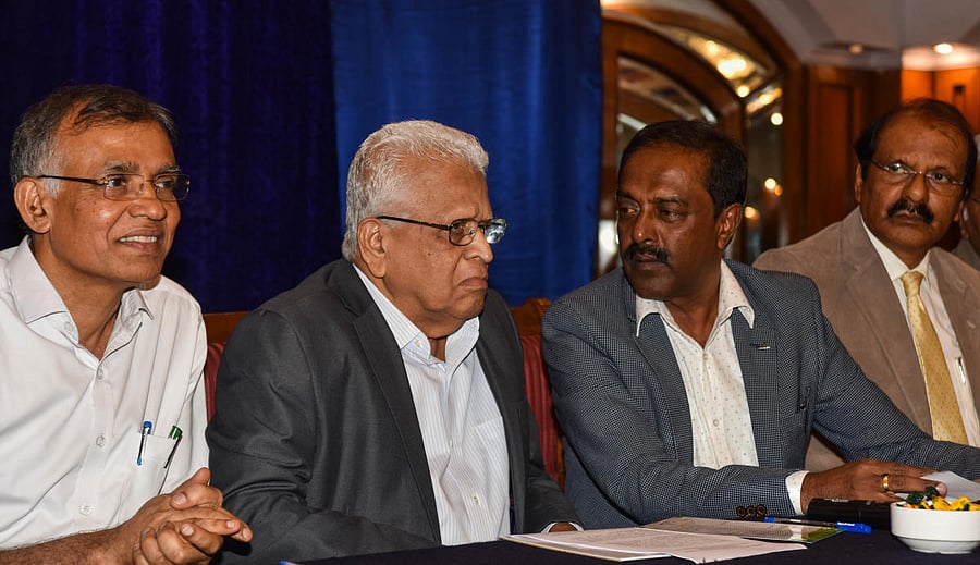 BU V-C K R Venugopal, N R Shetty, V-C, Central University of Karnataka, and V Sivaram of V Sivaram Research Foundation, at the conference on medicinal plants on Tuesday. dh photo