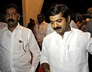 Suspended MLA's Rajan Salvi and MNS leader Ram Kadam coming out from Vidhan Bhavan in Mumbai on Wednesday from the Maharashtra Legislative Assembly suspended five MLAs for the rest of the current year, for assaulting a police officer in the Vidhan Bhavan premises Tuesday. PTI Photo