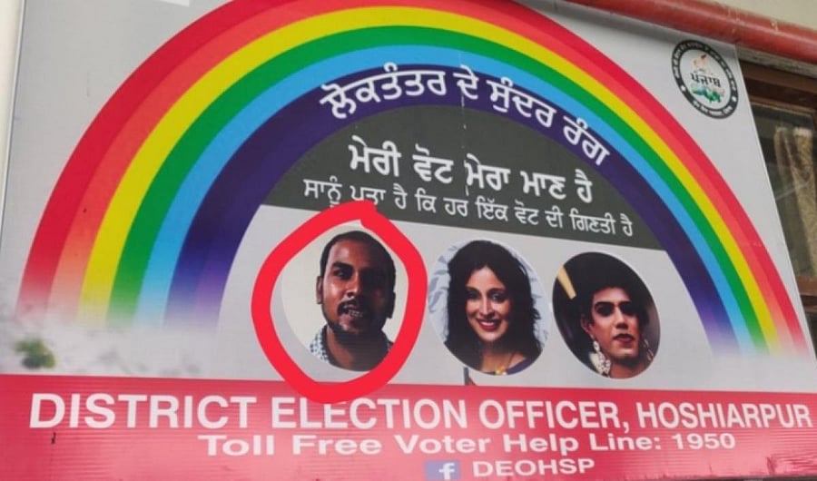 The flex boards with Mukesh Singh's picture (circled)