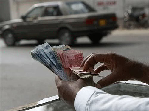 Pakistan is ready to offer India the most favoured nation (MFN) status from next month, provided New Delhi announces lower duties on 250-300 Pakistani items, a report said Sunday. Reuters File Photo.