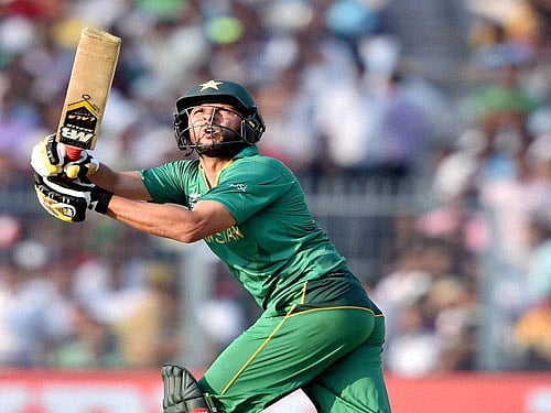 Pakistani batsman Shahid Afridi plays a shot during ICC T20 World cup match against Bangladesh at Eden Garden in Kolkata on Wednesday. PTI Photo