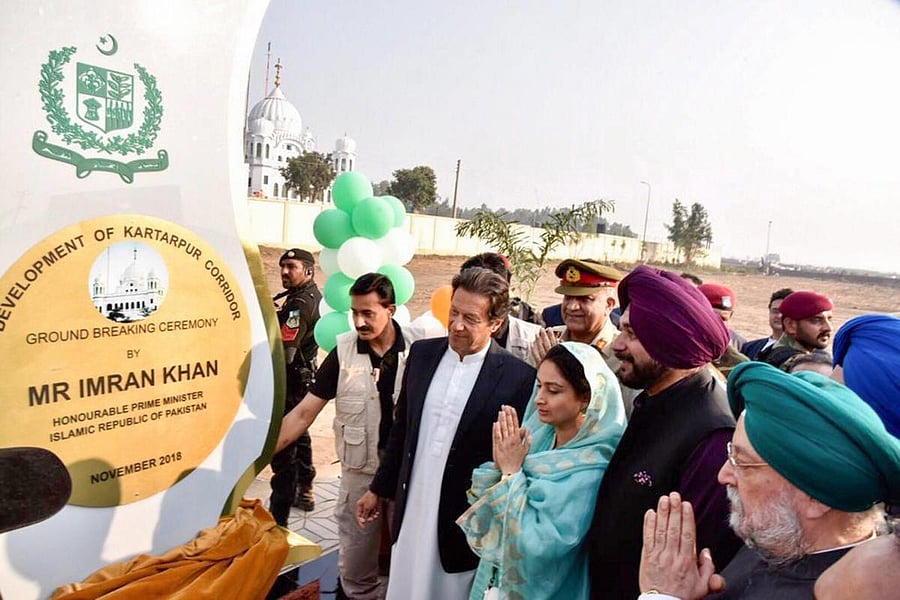 Pakistan's Prime Minister Imran Khan, cricketer-turned-Indian politician Navjot Singh Sidhu, Minister for Food Processing Industries Harsimrat Kaur Badal during ground breaking ceremony for Kartarpur corridor in Pakistan's Kartarpur on Nov. 28,