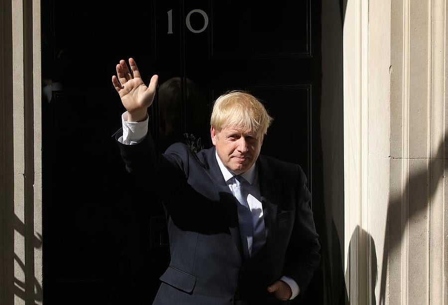 Britain's new Prime Minister Boris Johnson gestures after giving a speech outside 10 Downing Street in London on July 24, 2019. Photo credit: AFP