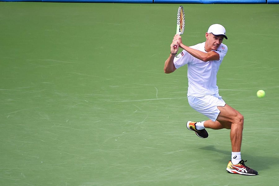 Alex De Minaur of Australia returns a backhand to Bradley Klahn during the BB&amp;T Atlanta Open at Atlantic Station on July 25, 2019 in Atlanta, Georgia. (Logan Riely/Getty Images/AFP)