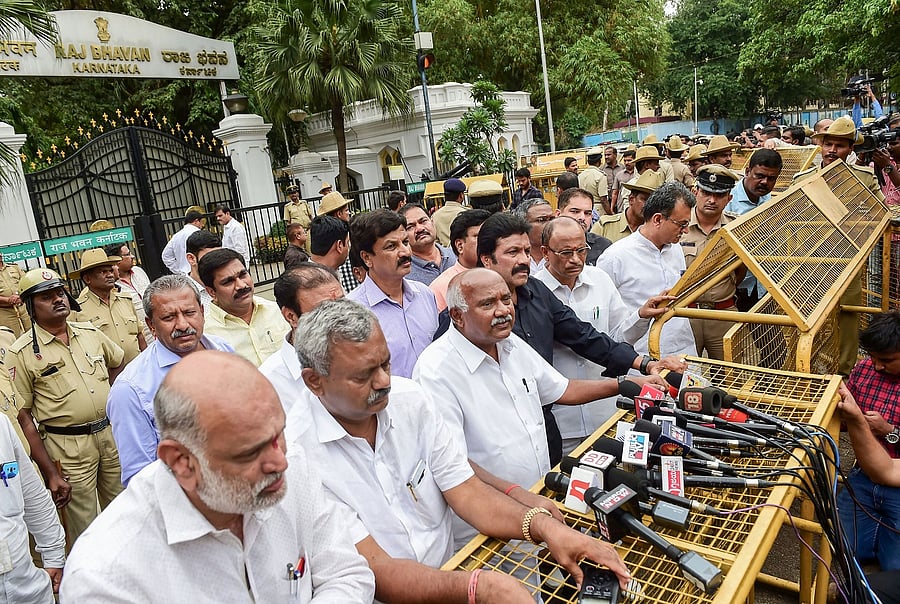 Former JD(S) president and rebel MLA A H Vishwanath (C) said the rebels will approach Supreme Court challenging the decision