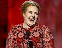Singer Adele accepts Best Pop Solo Performance for 'Set Fire to the Rain (Live)' onstage at the 55th Annual GRAMMY Awards at Staples Center on February 10, 2013 in Los Angeles, California. AFP Photp