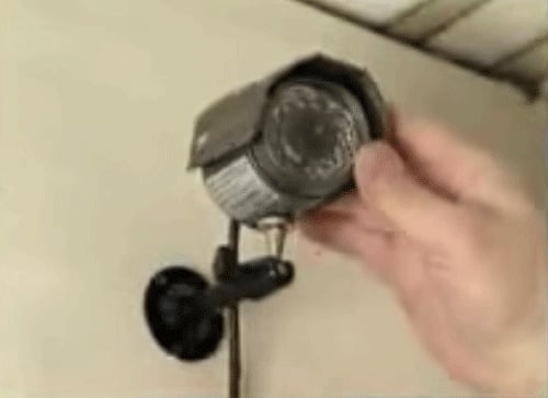 The CCTV visuals showed the unidentified woman walking away nonchalantly with the infant tucked in her clothes, police said today / Screen Grab