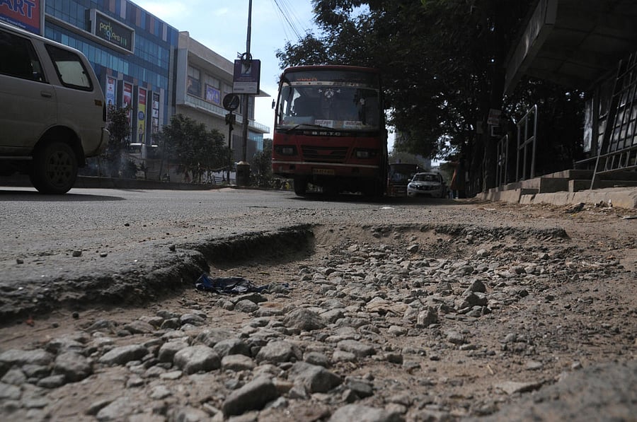 A badly damaged ITPL Main Road. DH FILE PHOTO