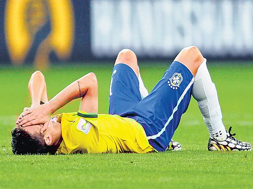 Brazilian players didn't know what hit them as goal after German goal destroyed their dreams at the Estadio Mineirao. AP
