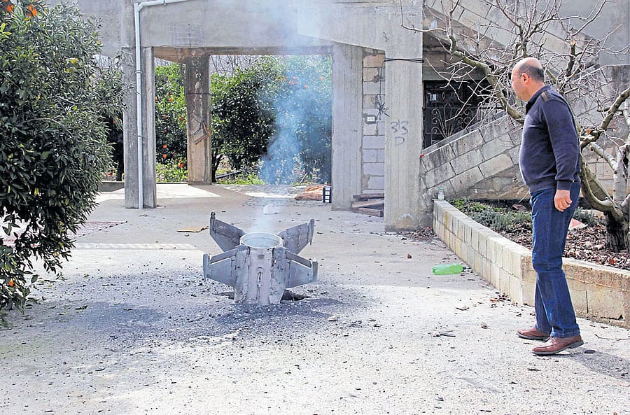 A picture taken on Saturday shows the remains of a missile that landed in the southern Lebanese village of Kaoukaba, near the border with Syria, after Israel's military attacked 12 Syrian and Iranian targets inside Syria in what it described as 'largescale' raids following an exchange of fire earlier in the day. AFP