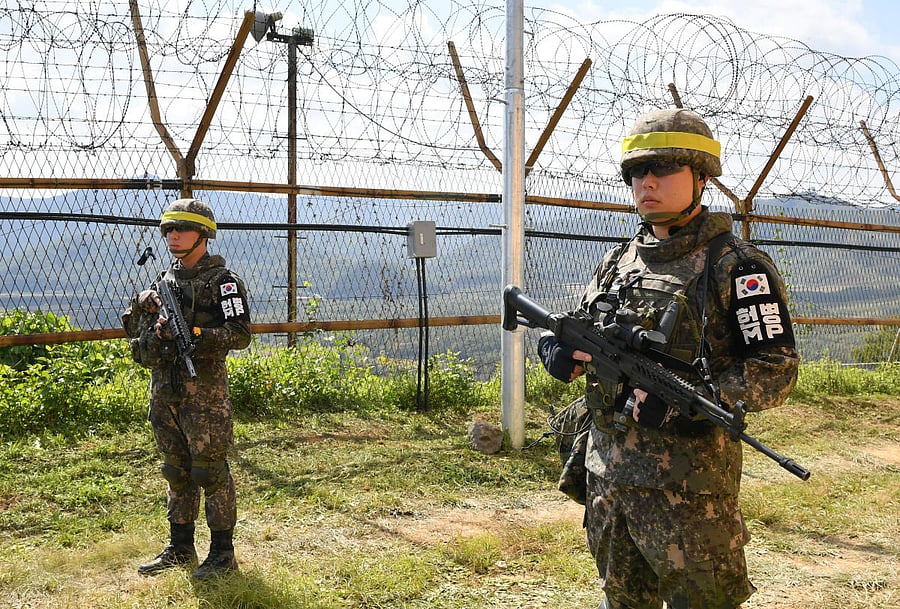 South Korean soldiers stand guard while removing landmines inside of the Demilitarized Zone (DMZ) in Cheorwon, South Korea last year (Song Kyung-Seok/Pool via REUTERS)