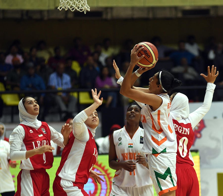 India's Harshitha Bopaiah attempts to score during their game against Iran on Sunday. DH Photo/ Srikanta Sharma R