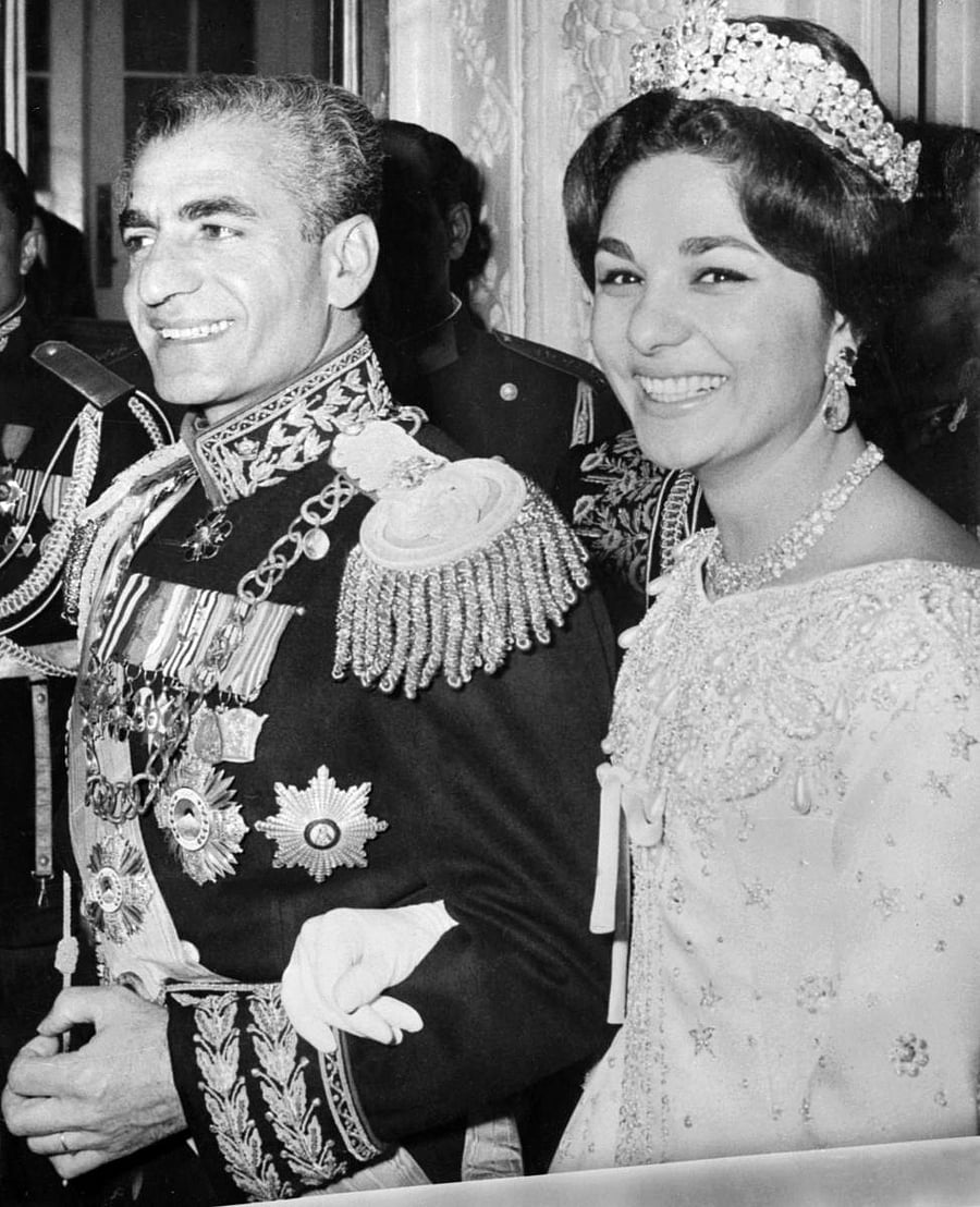 In this file photo taken on December 21, 1959, the Shah of Iran Mohammad Reza Pahlavi and his wife Farah Diba pose for a photograph during their wedding celebrations in Tehran.