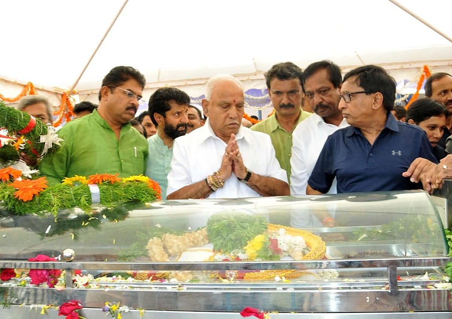 Chief Minister B S Yediyurappa pays homage to V G Siddharth Hegde.