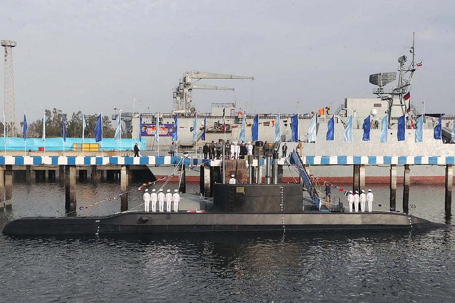 A handout picture provided by the Iranian presidency on February 17, 2019, shows Iranian President Hassan Rouhani during the unveiling Iran's first semi-heavy submarine named the Fateh (Farsi for 'Conqueror') at the Bandar Abbas naval base. AFP/HO/Iranian Presidency