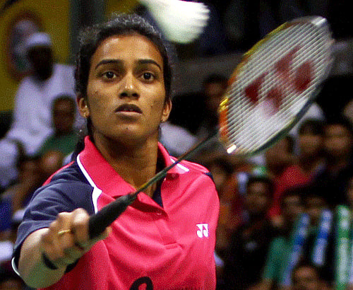 P V Sindhu in action against Thailand's Ratchanok Intanon during their Semifinal match at Yonex Sunrise India Open 2013 in New Delhi on Saturday. PTI Photo