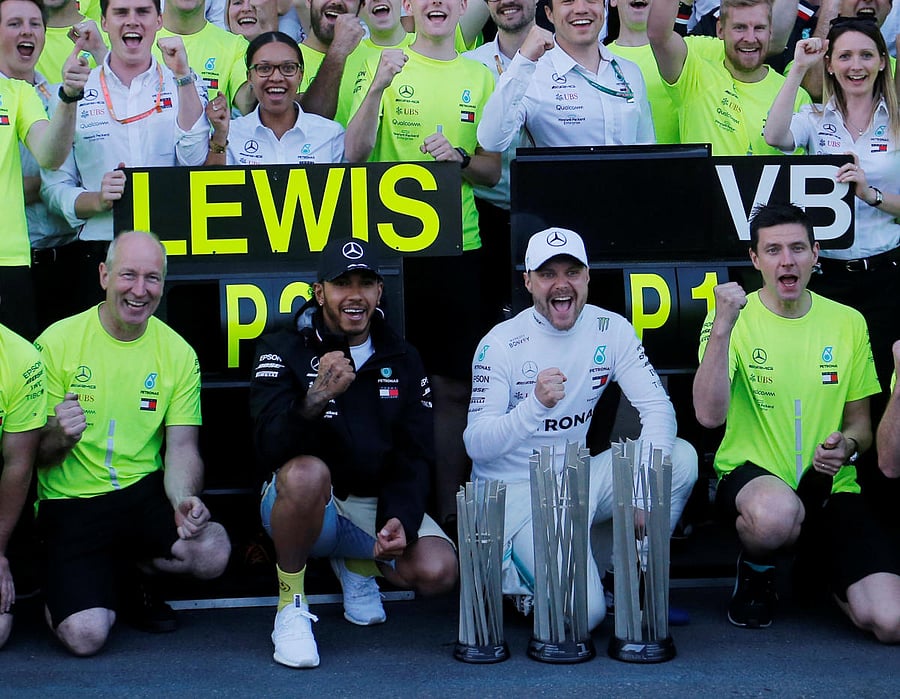 Mercedes' Valtteri Bottas celebrates winning the race with second-placed Lewis Hamilton and teammates. Reuters photo