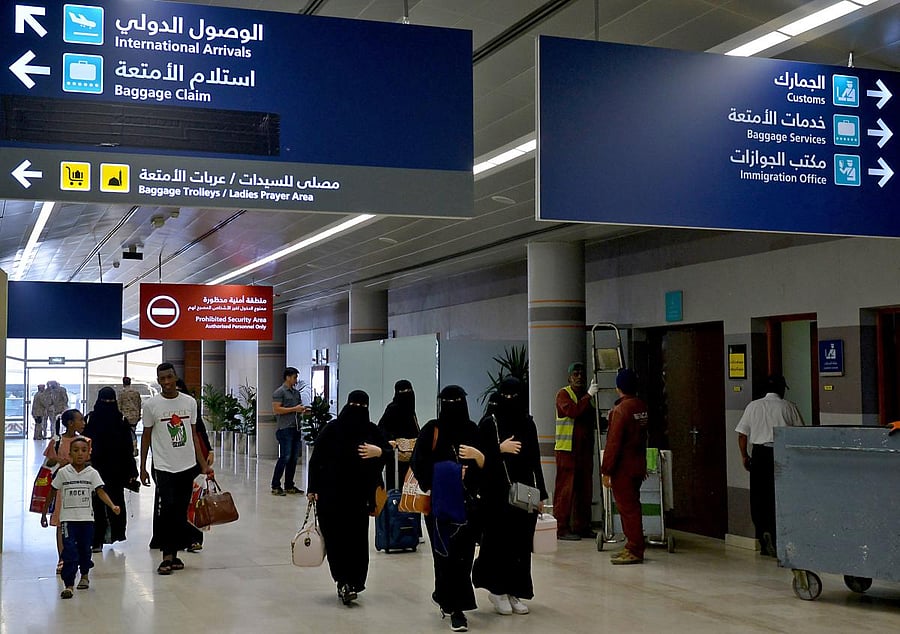 Saudi Arabia will allow women to obtain passports and travel abroad without approval from a male "guardian", the government said on August 2, ending a longstanding restriction that drew heavy international criticism. (AFP Photo)