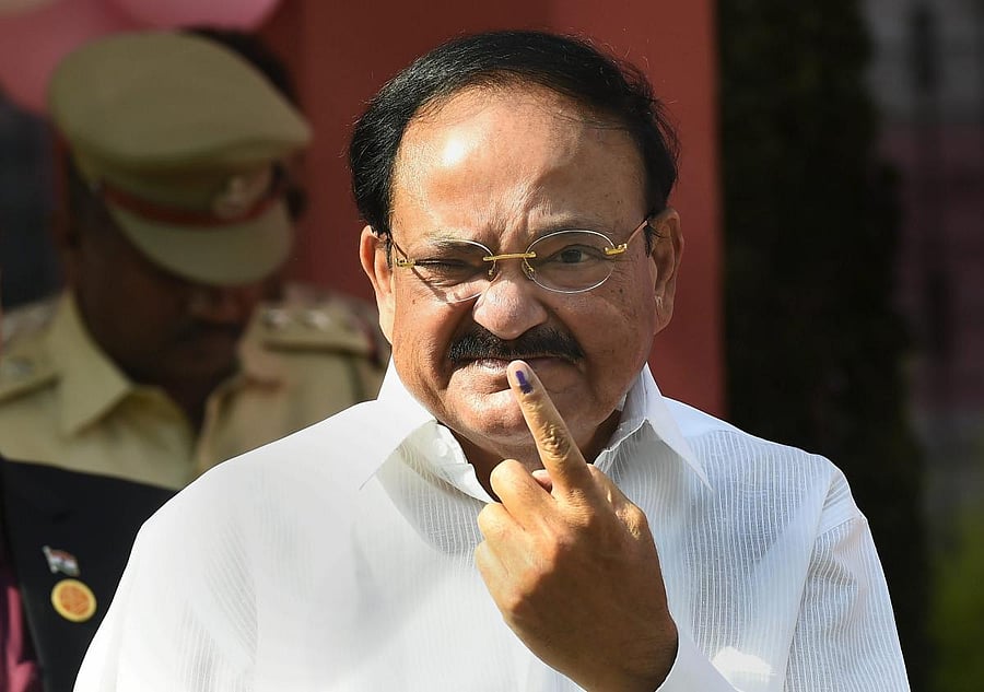  Vice President M Venkaiah Naidu shows his inked finger, during the sixth phase of Lok Sabha elections, in New Delhi, Sunday, May 12, 2019. (PTI Photo/Kamal Singh)