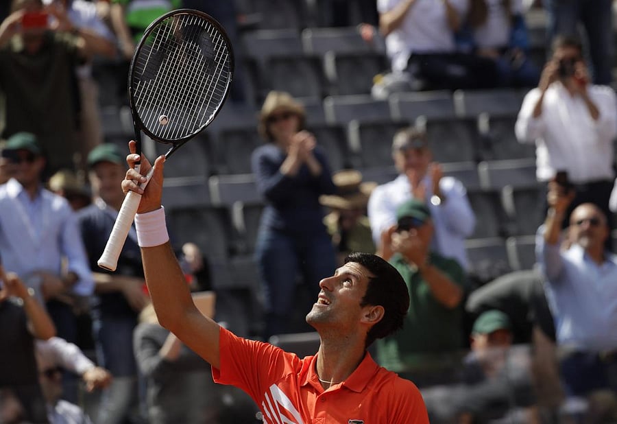 Rome: Serbia's Novak Djokovic celebrates after winning against Canada's Denis Shapovalov at the Italian Open tennis tournament, in Rome. (Photo by PTI)