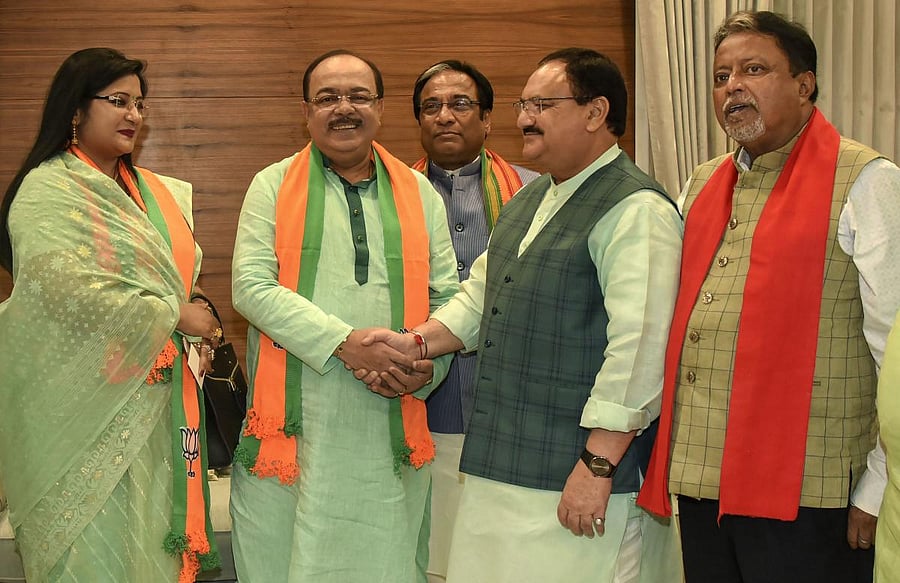 Former Kolkata Municipal Corporation mayor Sovan Chatterjee and his Professor Baisakhi Banerjee join Bharatiya Janata Party in the presence of party's working president J P Nadda, at the BJP HQ in New Delhi. (PTI Photo)