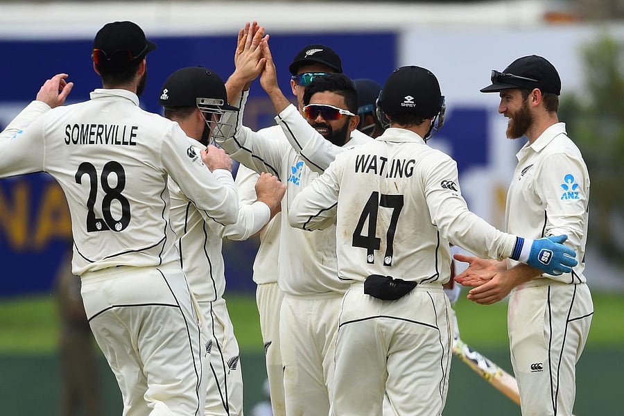 New Zealand's Ajaz Patel (C) celebrates with teammates after dismissing Sri Lanka's Lahiru Thirimanne. (AFP Photo)