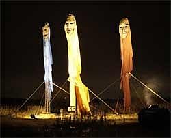 An installation entitled the 'wandering refugees' is seen outside the Bella center, at the Climate Conference in Copenhagen, Denmark, Monday, Dec. 7, 2009. The installation, inspired by Sudanese female refugees walking through the desert, is meant to symbolize the 200 million climate refugees that the U.N. climate change panel projects for the following 40 years. AP