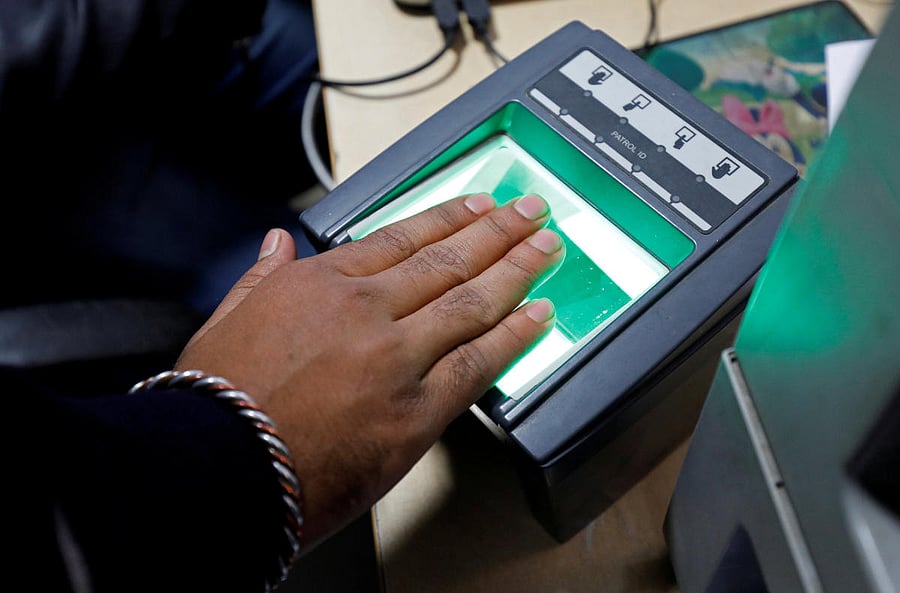 A woman goes through the process of finger scanning for the Unique Identification database system (File photo for representation)