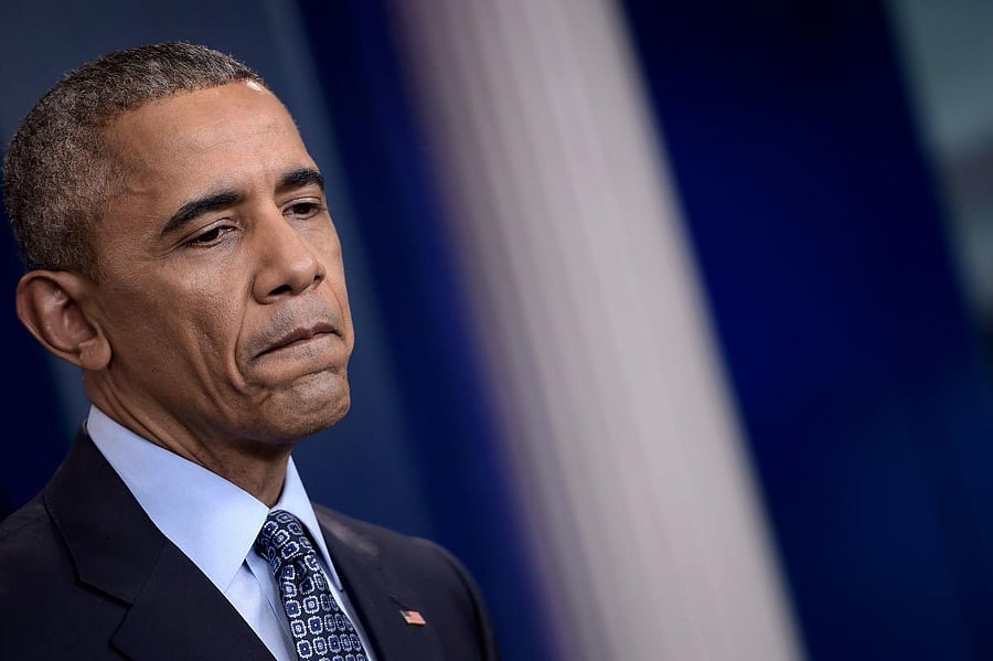 Former US President Barack Obama pauses during his final press conference at the White House in Washington, DC. (AFP Photo)