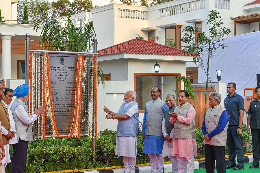 Prime Minister Narendra Modi inaugurates Lok Sabha Secretariat duplex flats in North Avenue in the presence of Lok Sabha speaker Om Birla, Housing & Urban Affairs Minister Hardeep Singh Puri and others in New Delhi on Monday. PTI