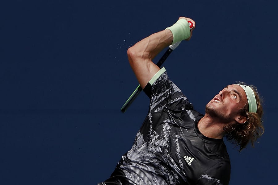 Stefanos Tsitsipas of Greece serves against Andrey Rublev of Russia in the first round on day two of the 2019 U.S. Open tennis tournament at USTA Billie Jean King National Tennis Center. Photo/Geoff Burke-USA TODAY Sports