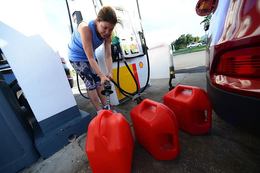 A resident fills gas cans in preparation for Hurricane Dorian on August 29, 2019 in Winter Springs, Florida. Gerardo Mora/Getty Images/AFP