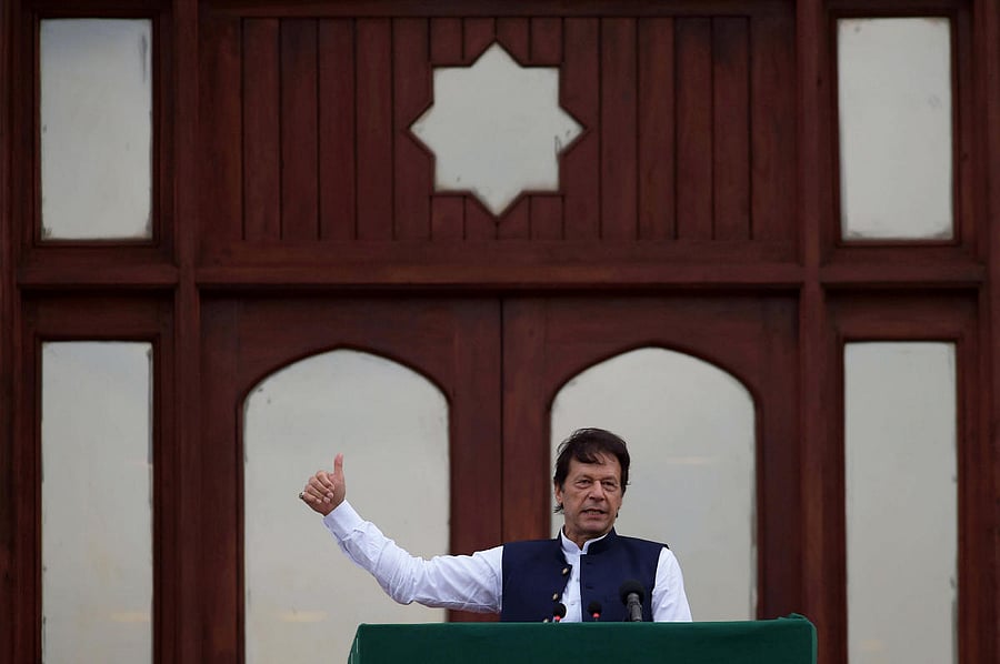 Pakistan's Prime Minister Imran Khan gestures as he speaks during a countrywide 'Kashmir Hour' demonstration to express solidarity with the people of Kashmir, at the Prime Minister's House in Islamabad (Reuters Photo)