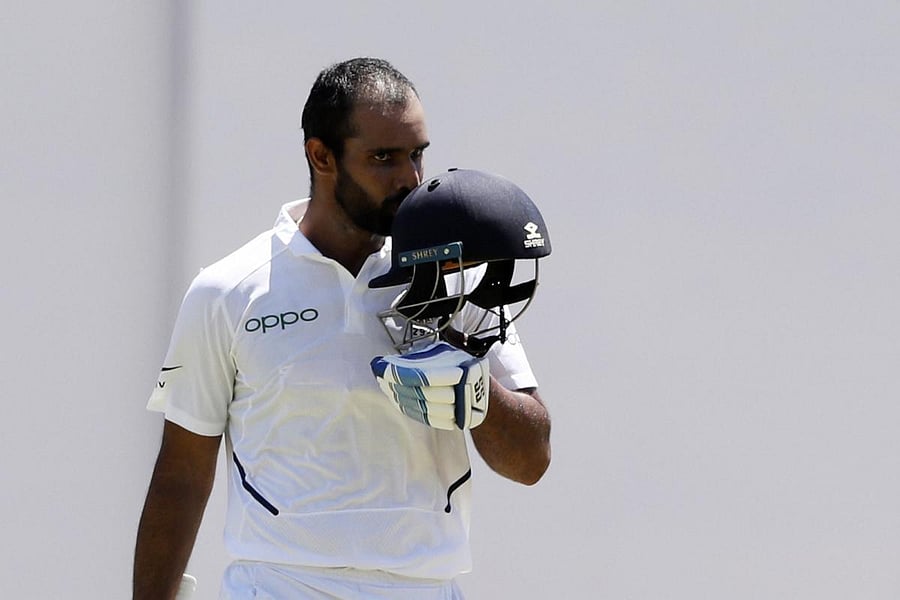 Hanuma Vihari celebrates after he scored a century against West Indies during day two of the second Test cricket match at Sabina Park cricket ground in Kingston, Jamaica Saturday, Aug. 31, 2019.AP/PTI