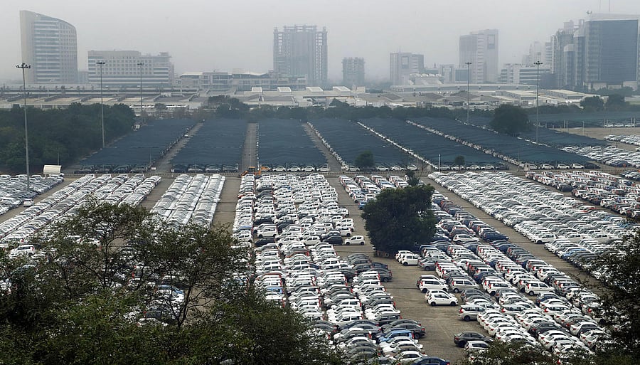 Newly manufactured Maruti Suzuki cars are seen parked inside the company factory in Manesar near Gurugram, Wednesday, Sept 4, 2019. PTI