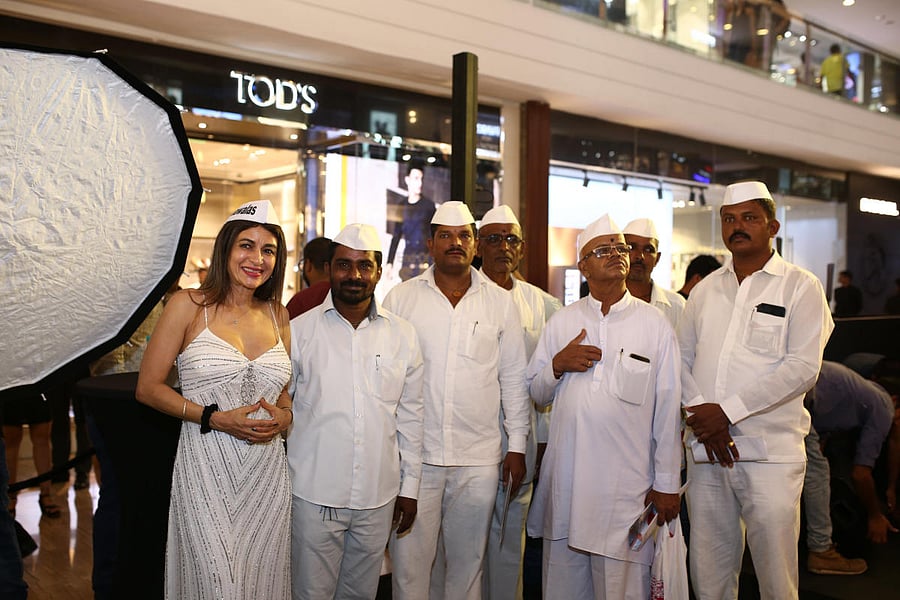 Chef Anaida Parvaneh (l) with the Dabbawalas at the comic book launch