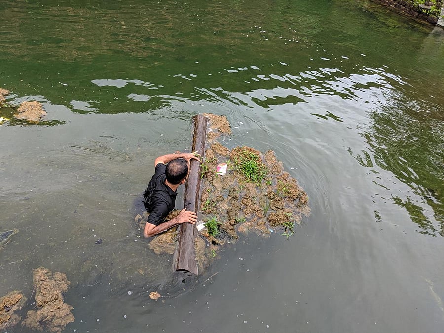Volunteers from the Swachh Karkala Brigade clean the waterbodies