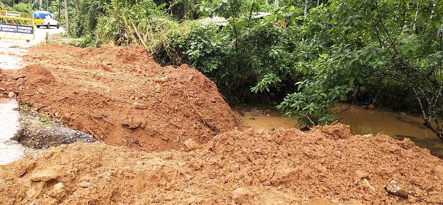 Soil used to fill up the pond located beside the highway at Madyangala in Puttur.